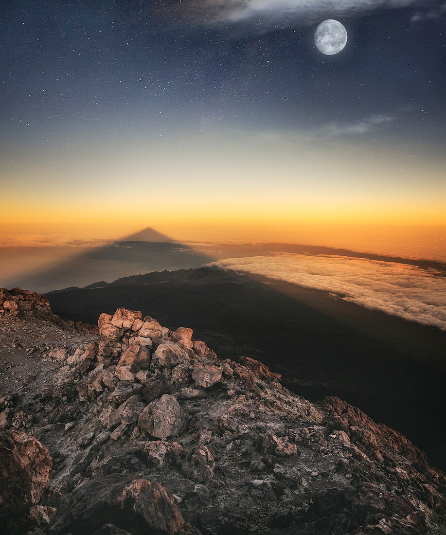 View of El Teide volcano shadow and full moon from the summit right before the sunrise, El Teide National Park, UNESCO World Heritage Site, Tenerife, Canary Islands, Spain, Atlantic, Europe
