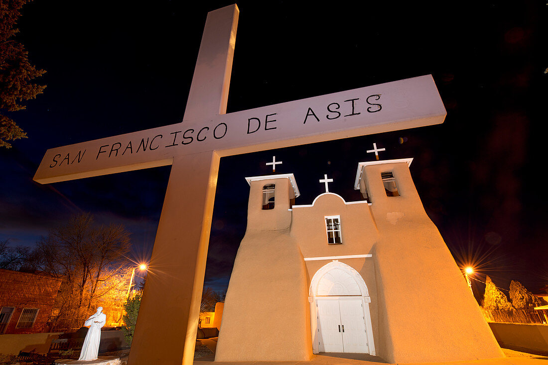 The historic adobe San Francisco de Asis church in Taos at twilight, Taos, New Mexico, United States of America, North America