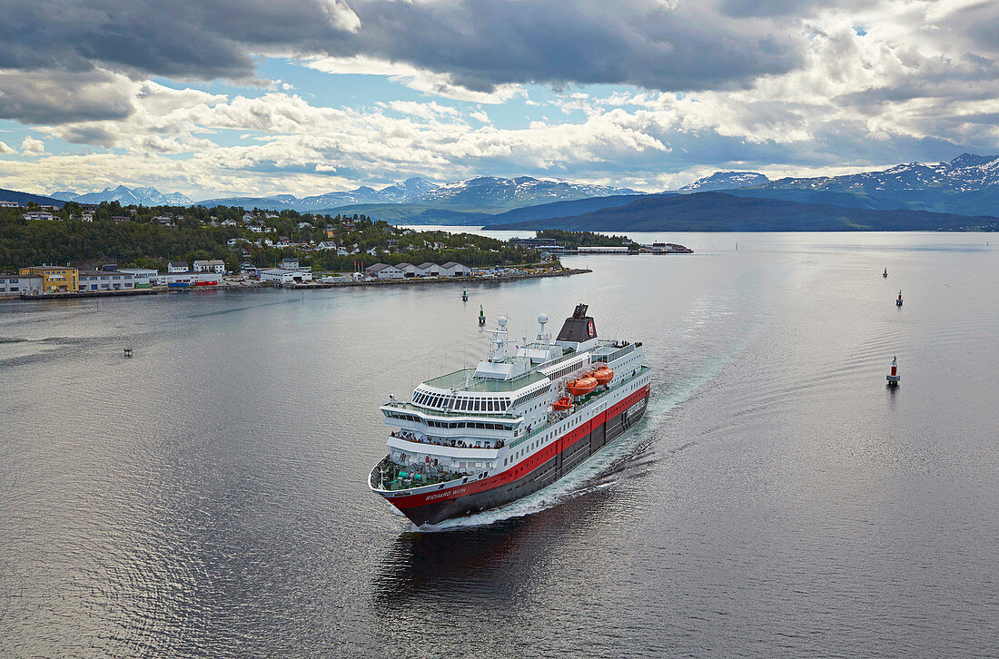 Hurtigruten - ship in Finnsnes on Gisundet, Senja island, Troms, Norway, Europe
