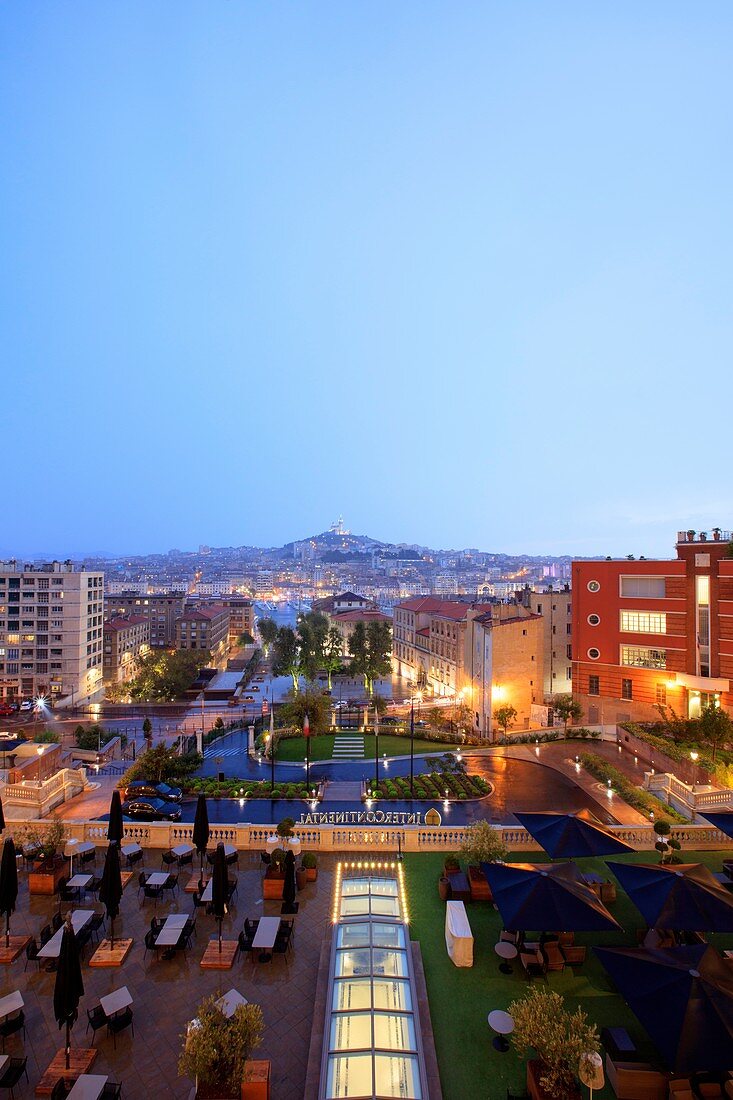 France, Bouches du Rhone, Marseille, Euromediterranee zone, city hall district, Villeneuve Bargemon square, Notre Dame de la Garde basilica from the hotel Intercontinental, the former Hotel Dieu (16th century)