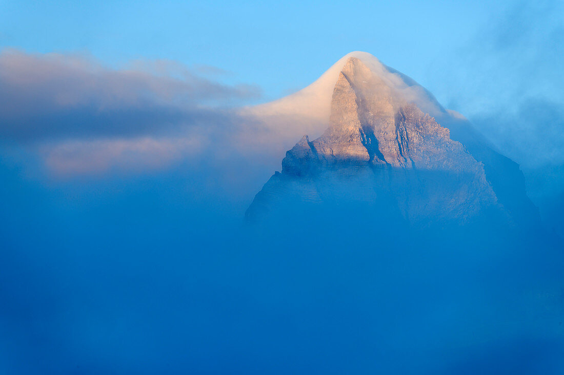 Summit of Dents du Midi protruding from clouds, from Dent de Morcles, Bernese Alps, Vaud, Vaud, Switzerland