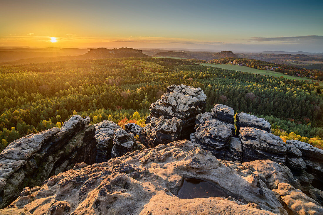 Sunset at Gohrisch with rocks in the foreground, Gohrisch, Saxon Switzerland National Park, Saxon Switzerland, Elbe Sandstone, Saxony, Germany