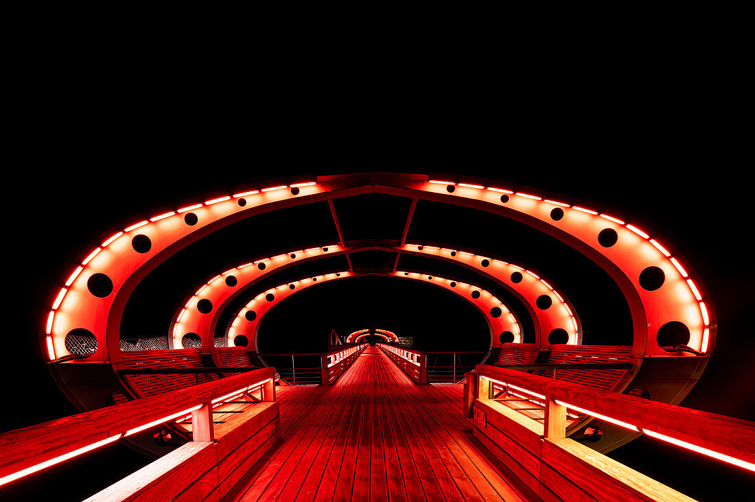 Light illumination of the pier in Kellenhusen, Baltic Sea, Ostholstein, Schleswig-Holstein, Germany