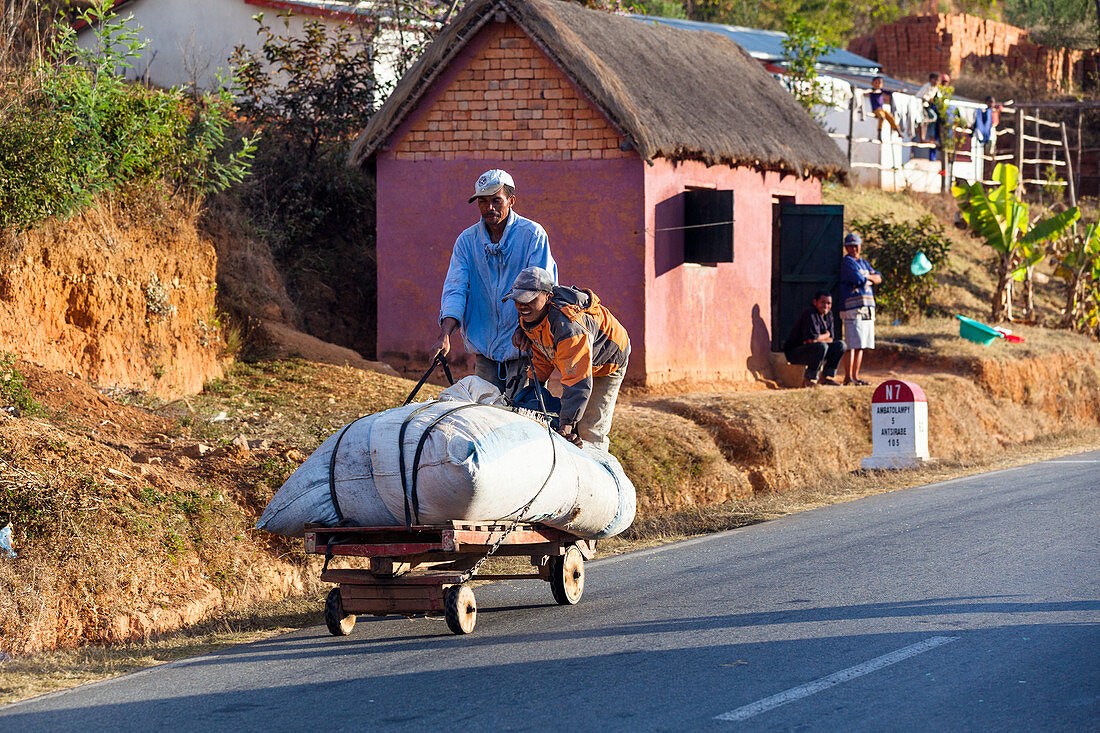 Malagasy people with cart, Madagascar, Africa