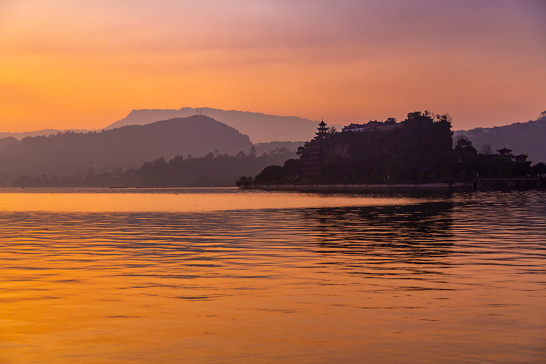 View of Shi Baozhai Pagoda at dusk on Yangtze River near Wanzhou, Chongqing, People's Republic of China, Asia