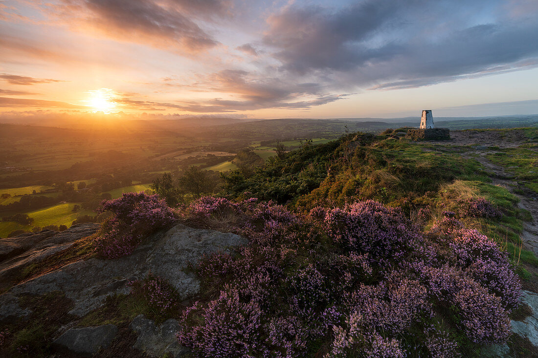 The survey point at Cloudside with amazing sunrise in summer, Congleton, Cheshire, England, United Kingdom, Europe