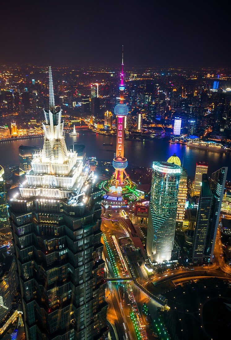 Aerial view of the Pudong Financial district at dusk, Shanghai, China.