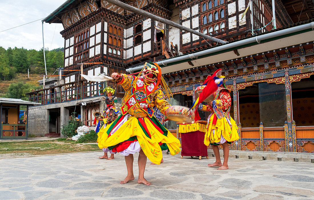 Bhutanese people performing the masked Cham Dance, Paro, Bhutan, Asia