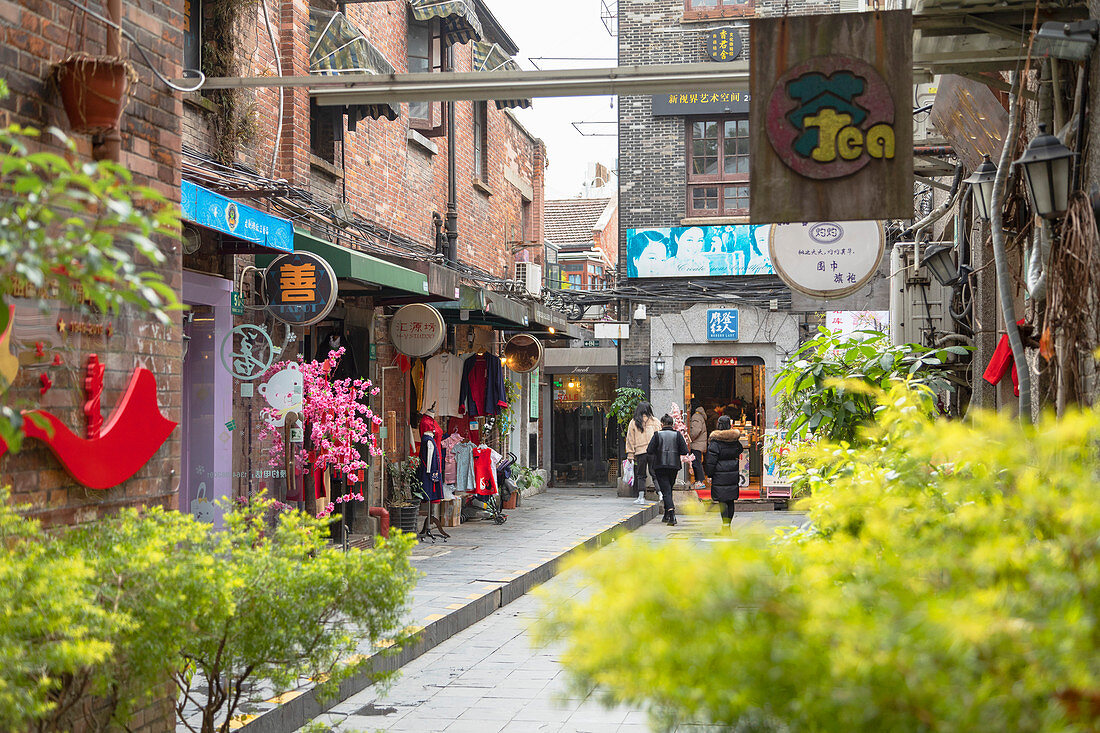People walking around alleyways of Tianzifang, Shanghai, China, Asia