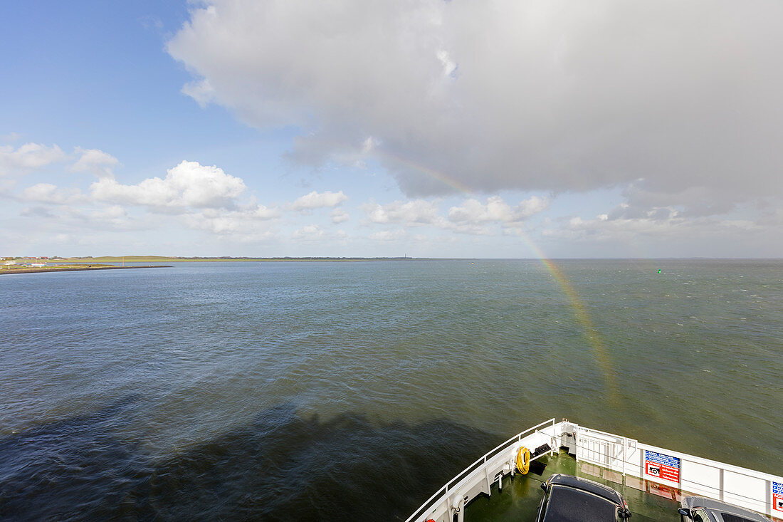 Rainbow at the stern of the ferry, North Sea, ship, Schauer, Norderney, East Frisia, Lower Saxony, Germany
