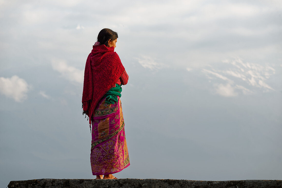 Nepalese woman in front of Annapurna, Pokhara, Nepal, Himalaya, Asia.