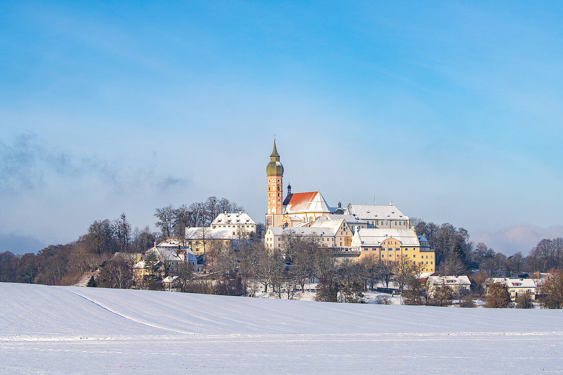 Andechs Monastery in a snowy winter landscape, Andechs, Bavaria, Germany.
