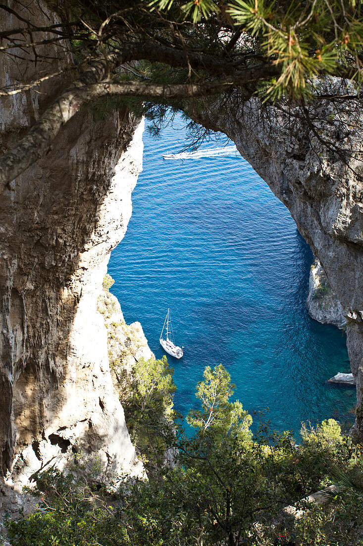 View at sea through the Arco Naturale in Capri, Italy