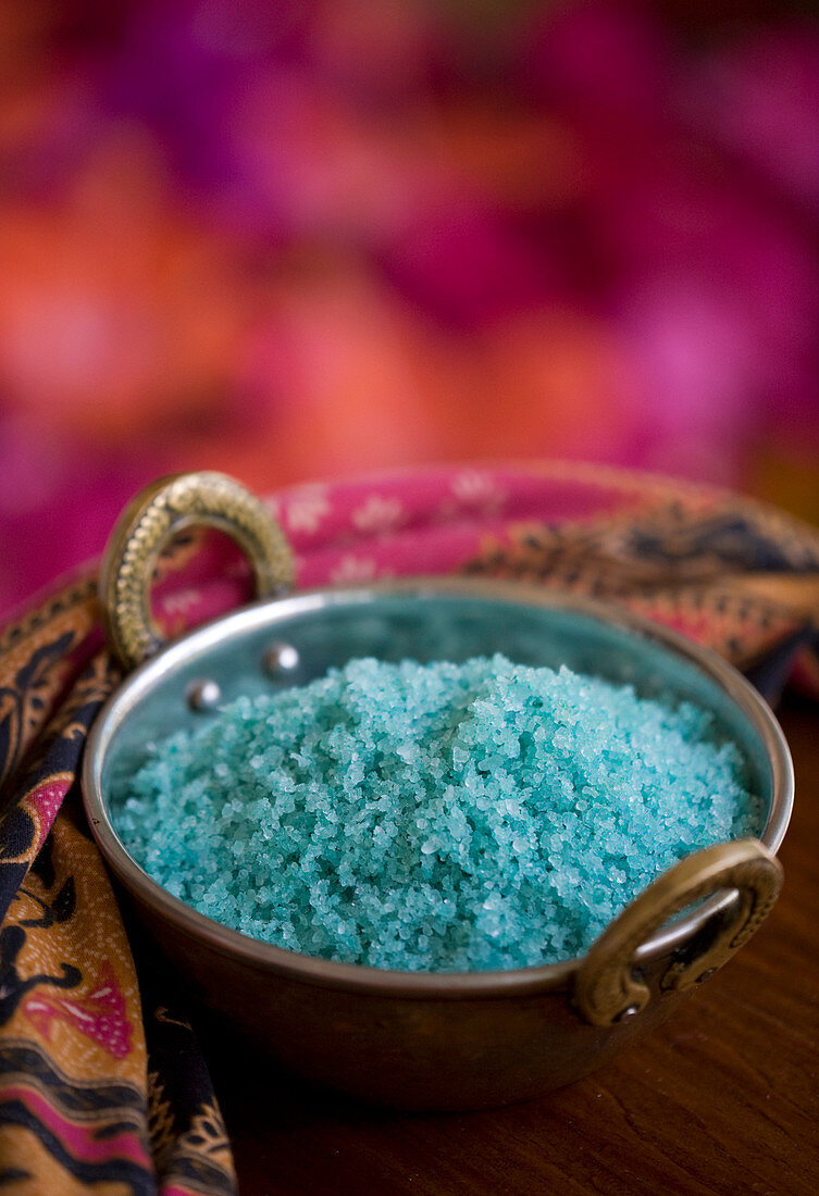 Detail shot of a bowl blue salt for spa treatments. St. Lucia, West Indies.