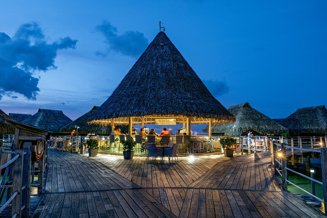 Toatea Creperie & Bar on pier to overwater bungalows at Hilton Moorea Lagoon Resort & Spa, Moorea, Windward Islands, French Polynesia, South Pacific