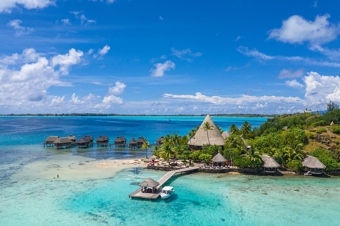 Aerial view of Sofitel Bora Bora Private Island Resort with overwater bungalows in Bora Bora Lagoon, Vaitape, Bora Bora, Leeward Islands, French Polynesia, South Pacific