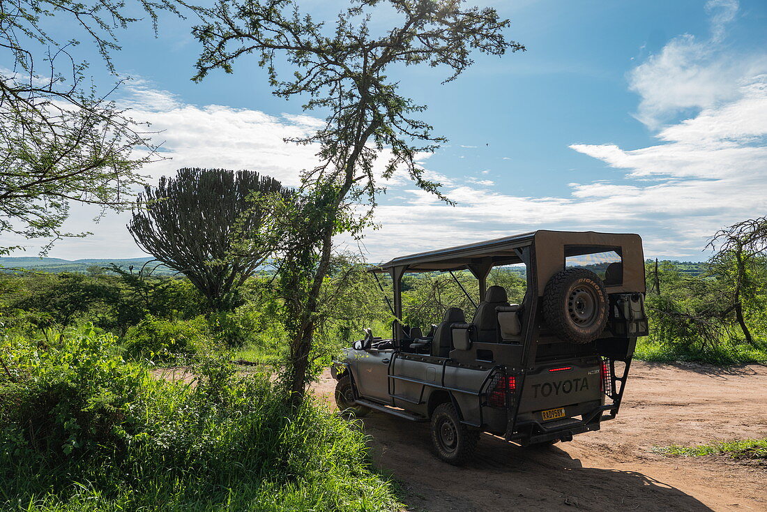 Safari Fahrzeug betrieben von Luxusresort Zeltcamp Magashi Camp (Wilderness Safaris), Akagera National Park, Eastern Province, Ruanda, Afrika