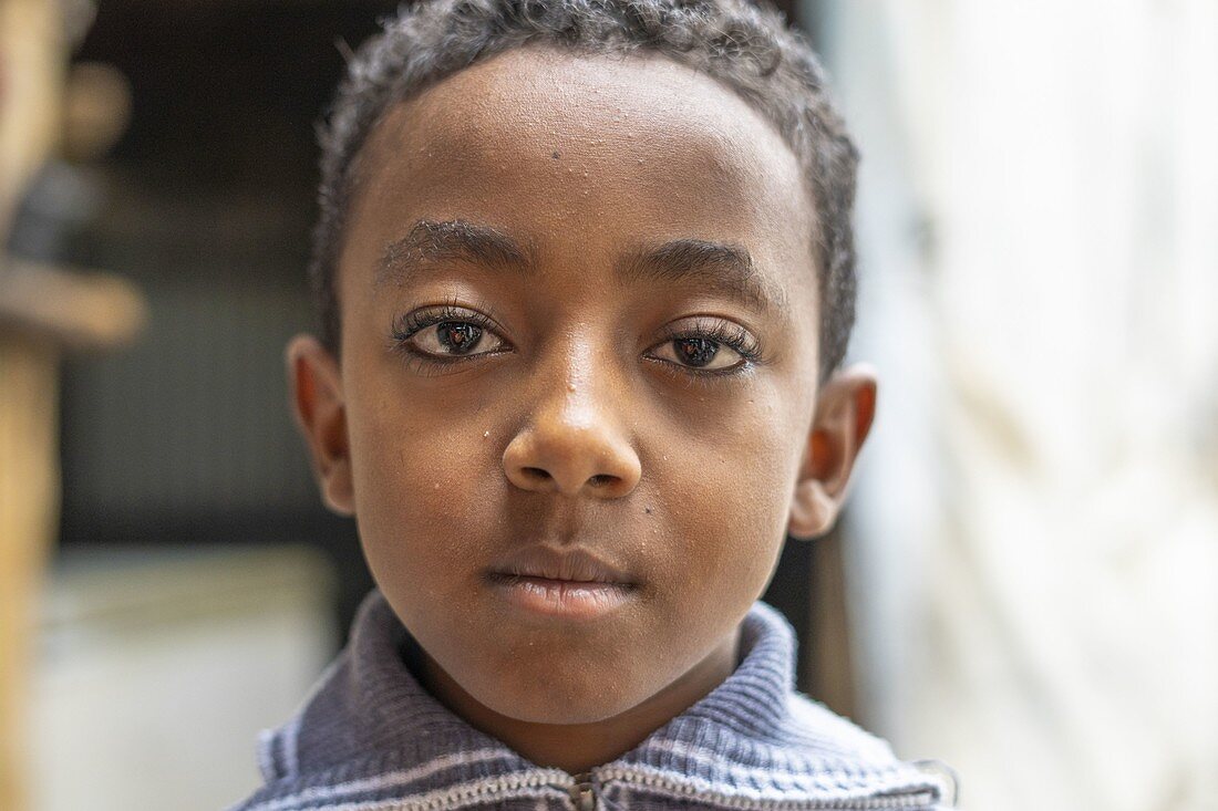Portrait of sad looking boy, Berhale, Afar Region, Ethiopia, Africa