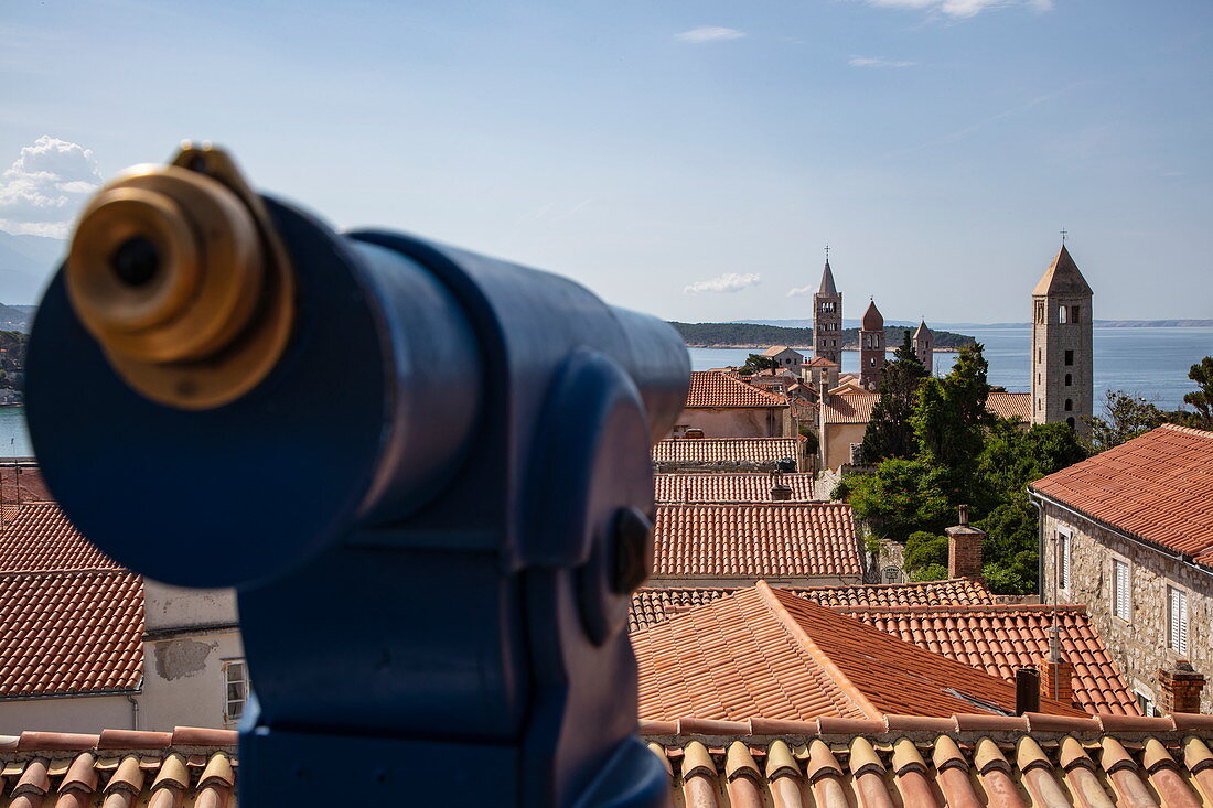 Telescope with a view over roofs of the old town and church towers, Rab, Primorje-Gorski Kotar, Croatia, Europe