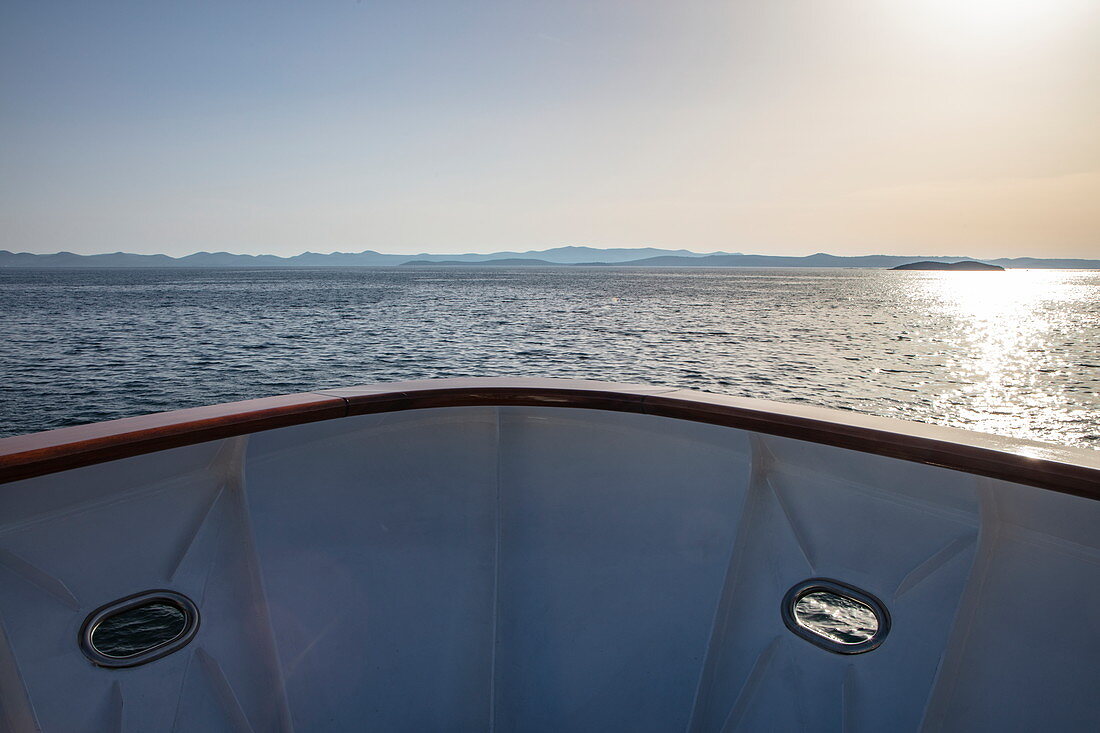 Bow of cruise ship at sunset, near Kukljica, Zadar, Croatia, Europe