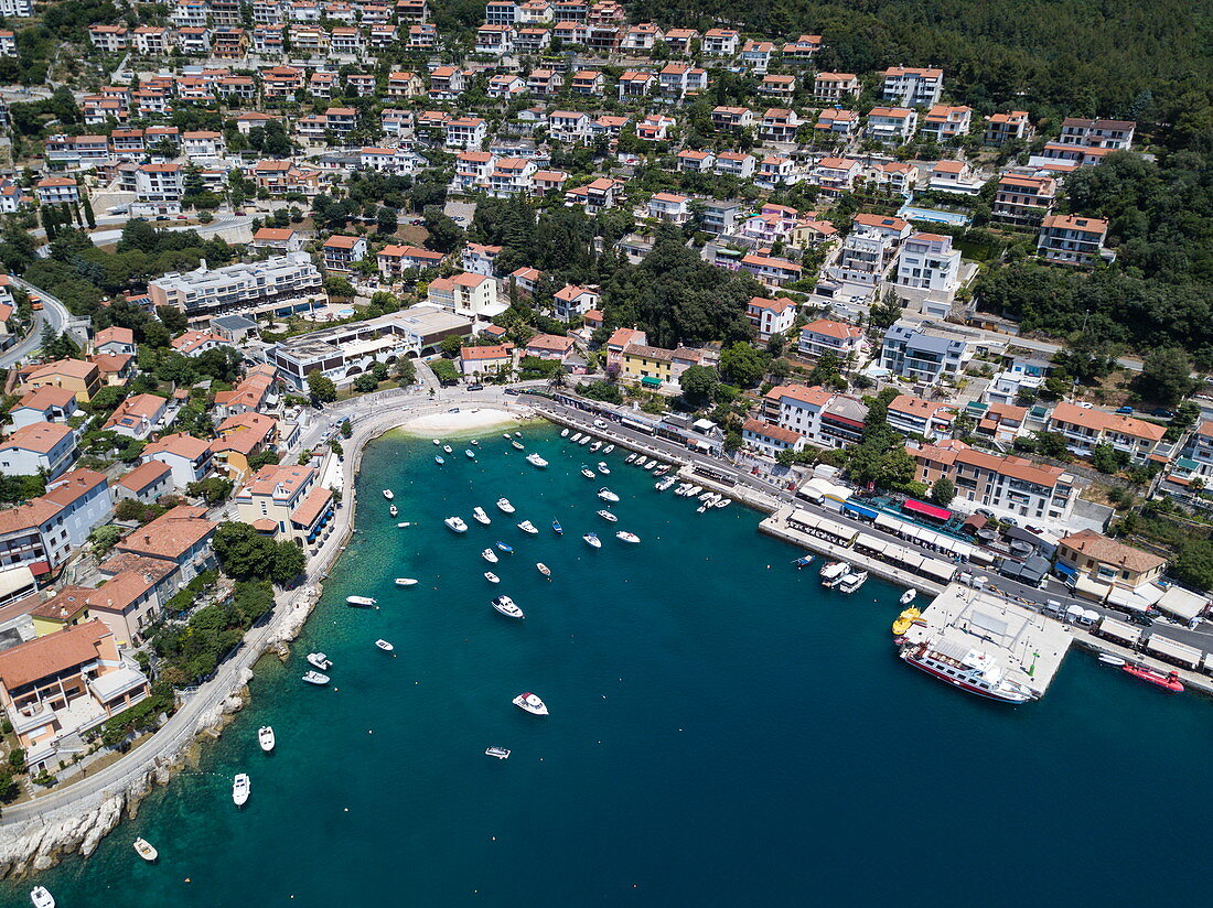 Aerial view of fishing boats and yachts in harbor in front of town, Rabac, Istria, Croatia, Europe