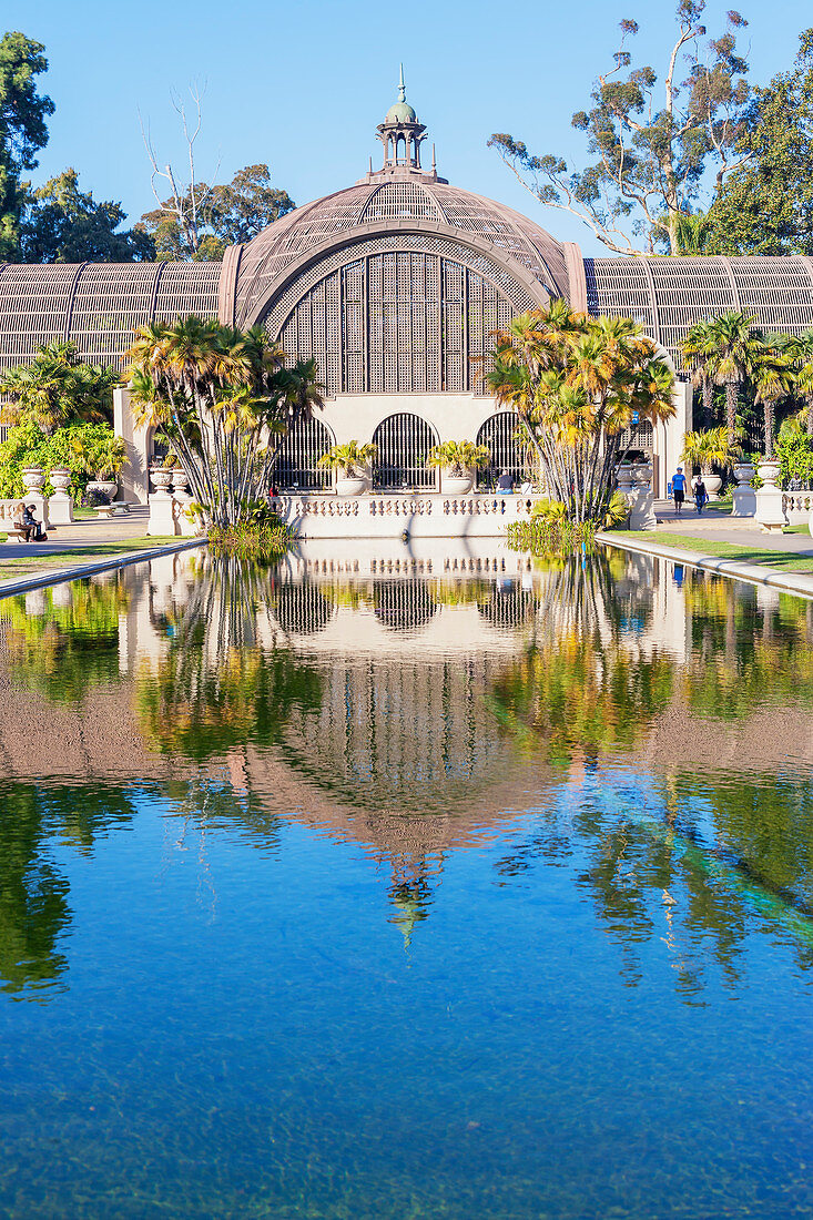 Botanical building viewed across Lily Pond, San Diego, California, USA