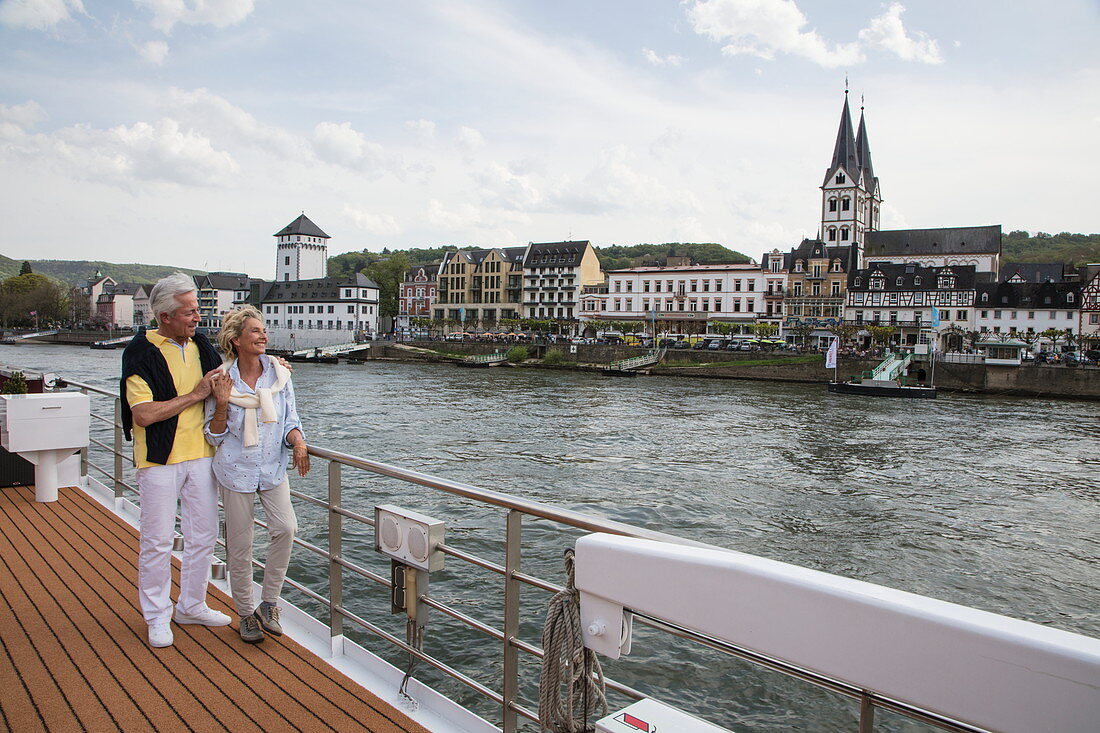 Couple on sundeck of river cruise ship during a cruise on the Rhine, Boppard, Rhineland-Palatinate, Germany, Europe