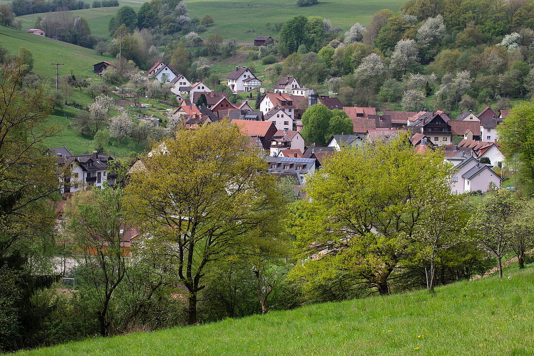 View over village in spring, Habichsthal, near Frammersbach, Spessart-Mainland, Franconia, Bavaria, Germany, Europe