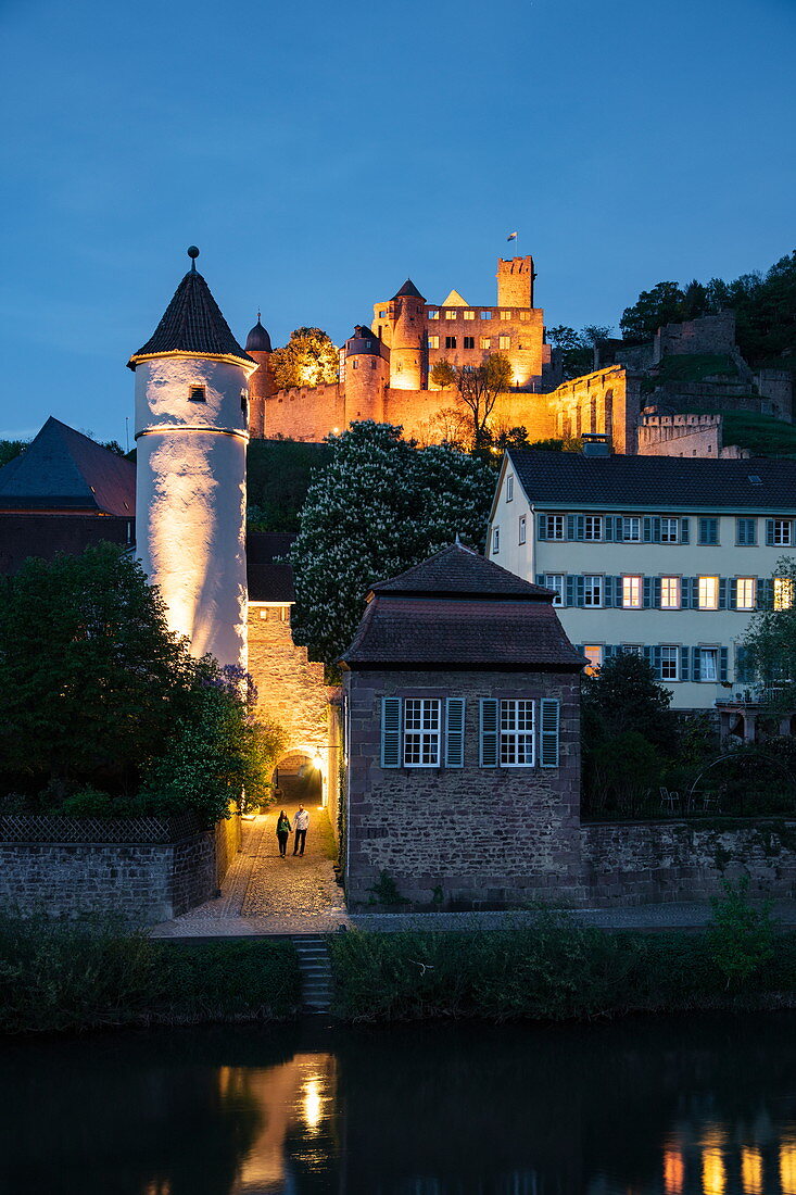 The Tauber flows gently past the old town with the Roter Turm am Faultor (Kittsteintor), collegiate church and Wertheim Castle at dusk, Wertheim, Spessart-Mainland, Franconia, Baden-Wuerttemberg, Germany, Europe