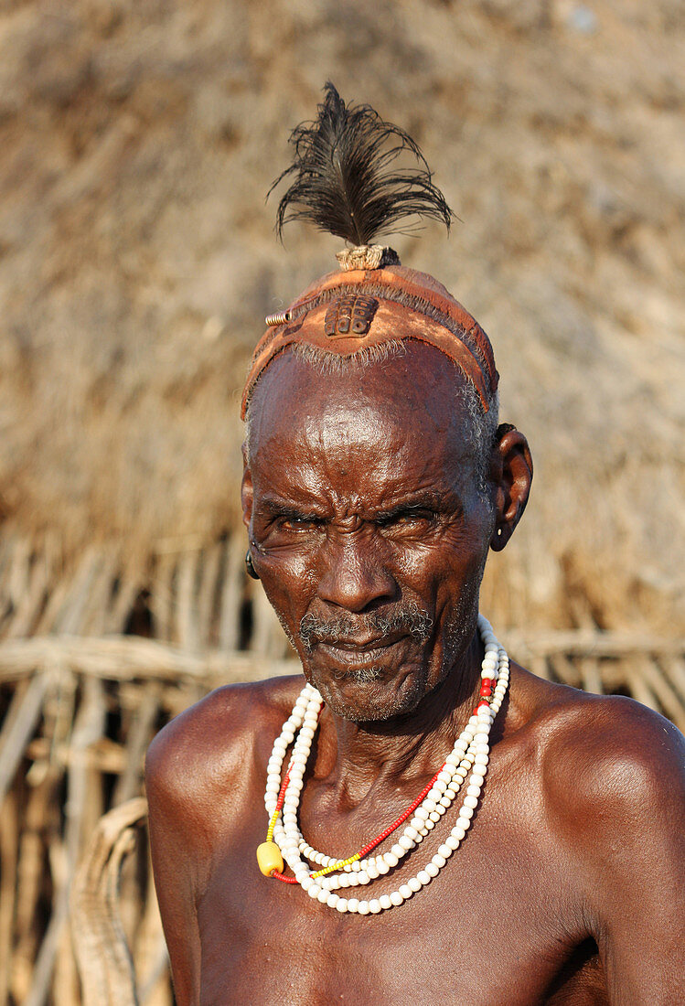 Ethiopia; Southern Nations Region; southern Ethiopian highlands; Hamer village near Turmi; Hamer man; Village elder; Head of the family