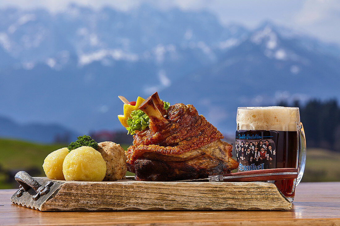 Bavarian specialty with a view of the Kaiser Mountains, Reit im Winkl, Chiemgau, Bavaria, Germany