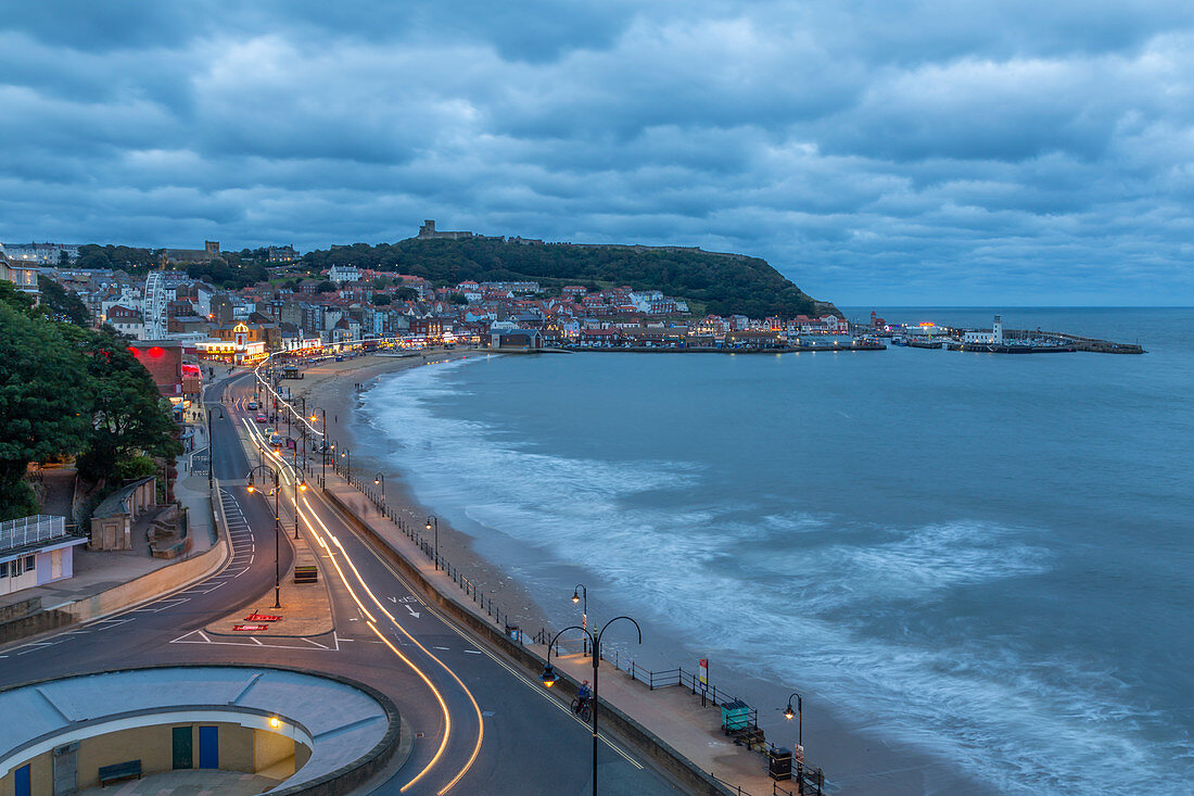 View of South Bay and Scarborough at dusk, Scarborough, North Yorkshire, Yorkshire, England, United Kingdom, Europe