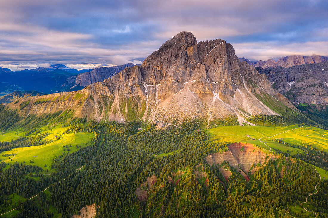 Aerial view of Sass De Putia (Peitlerkofel) and canyon surrounded by woods, Passo Delle Erbe, Dolomites, South Tyrol, Italy, Europe