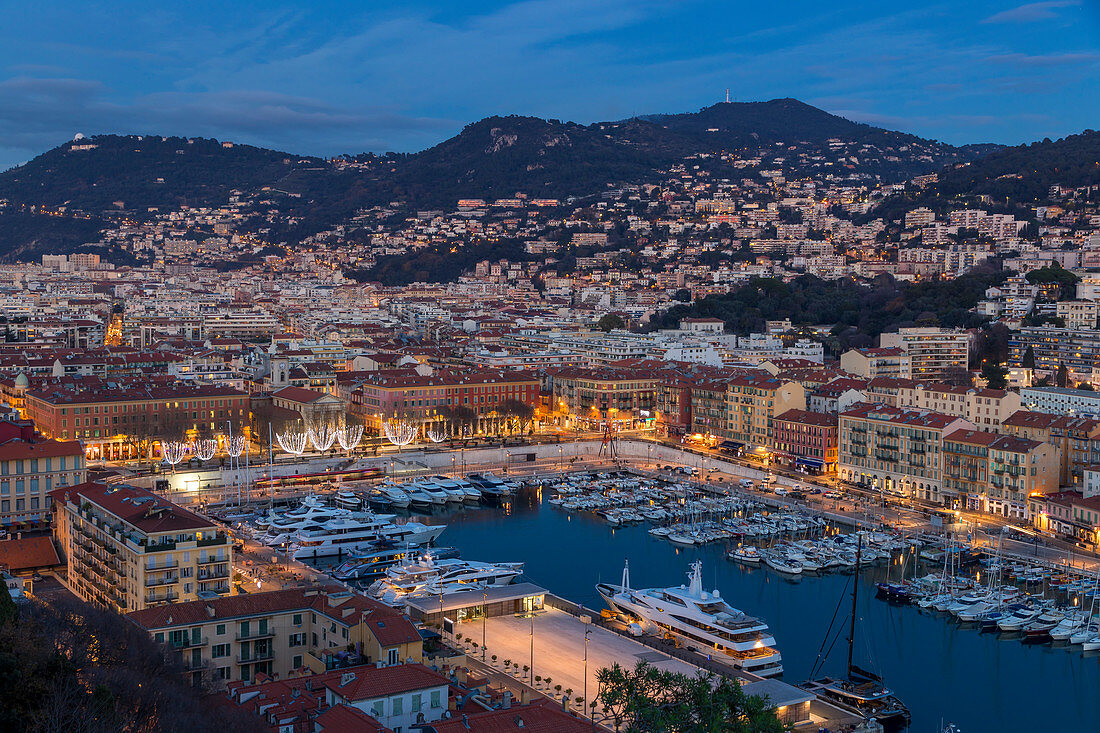 Elevated view from Castle Hill down to Port Lympia at dusk, Nice, Alpes Maritimes, Cote d'Azur, French Riviera, Provence, France, Mediterranean, Europe