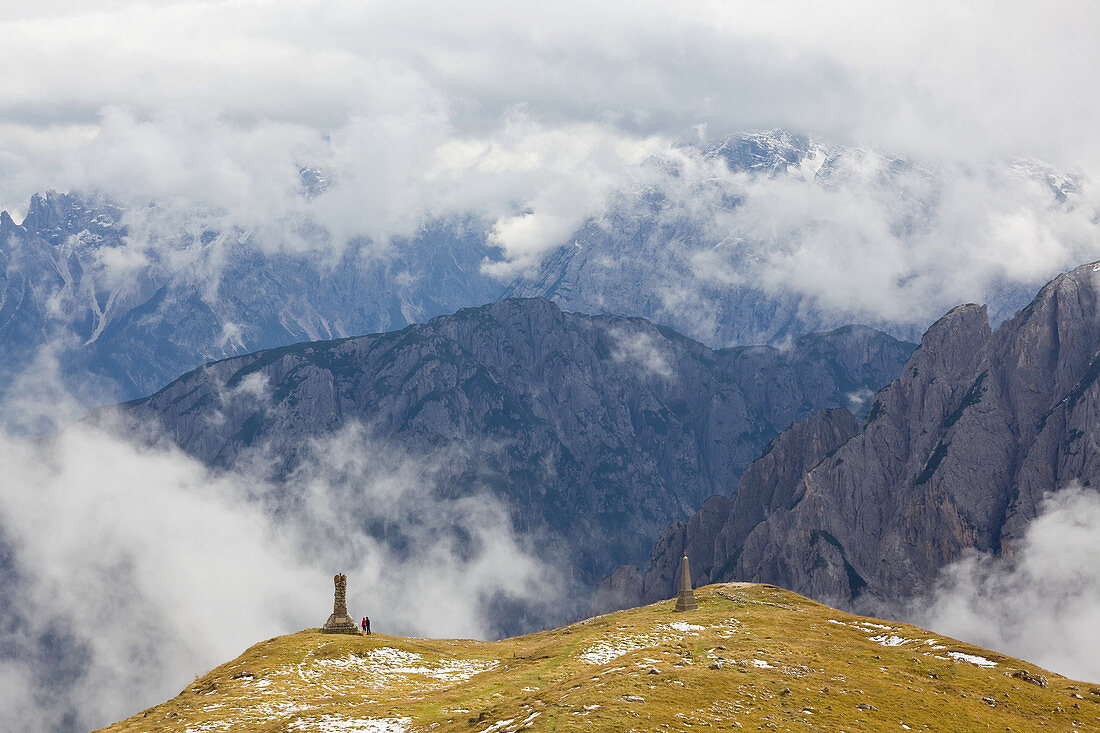 Walkers and monuments, Trentino-Alto Adige, South Tyrol in Bolzano district, Alta Pusteria, Hochpustertal,Sexten Dolomites, Italy