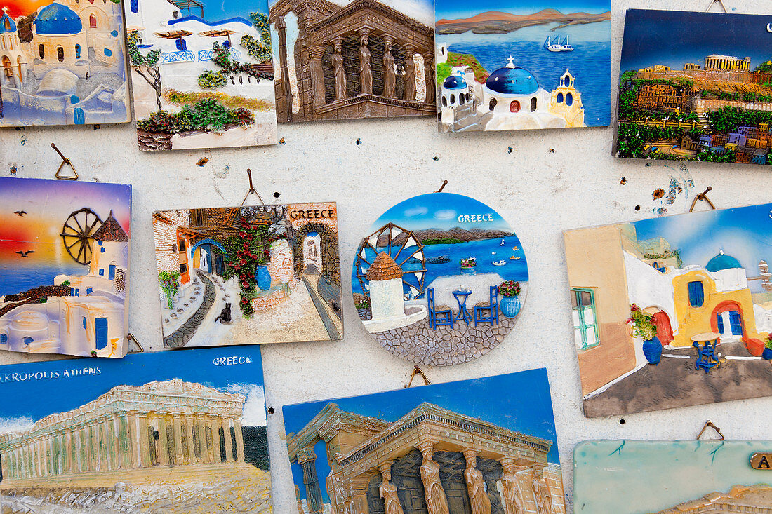 Souvenirs, colourful plaques of tourist destinations in Greece.