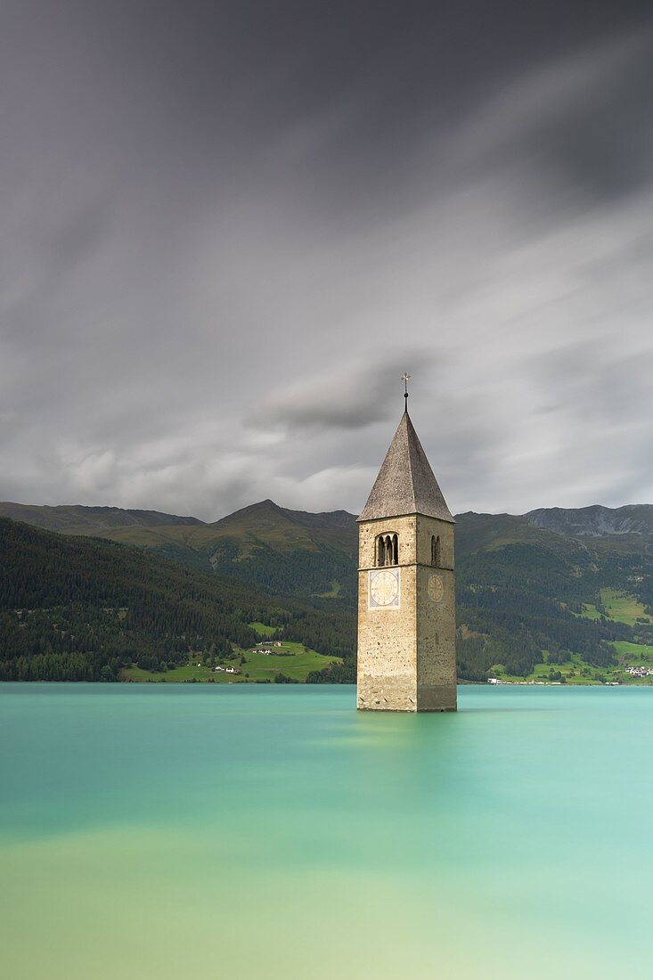 The bell-tower of Graun in Vinschgau, Reschensee - Lago di Resia, Bolzano, South Tyrol, Trentino Alto Adige, Italy, Europe