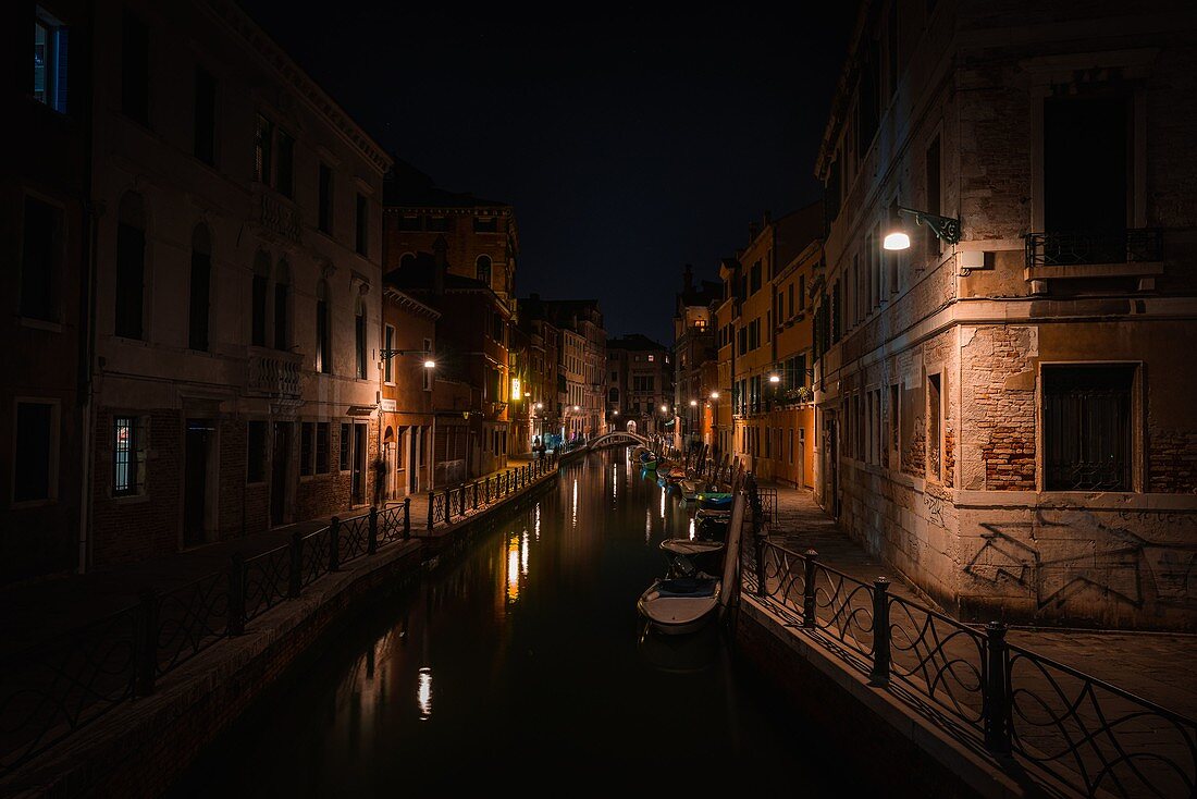 Italy, Veneto, Venice. The atmosphere of Venice's canal in the night.