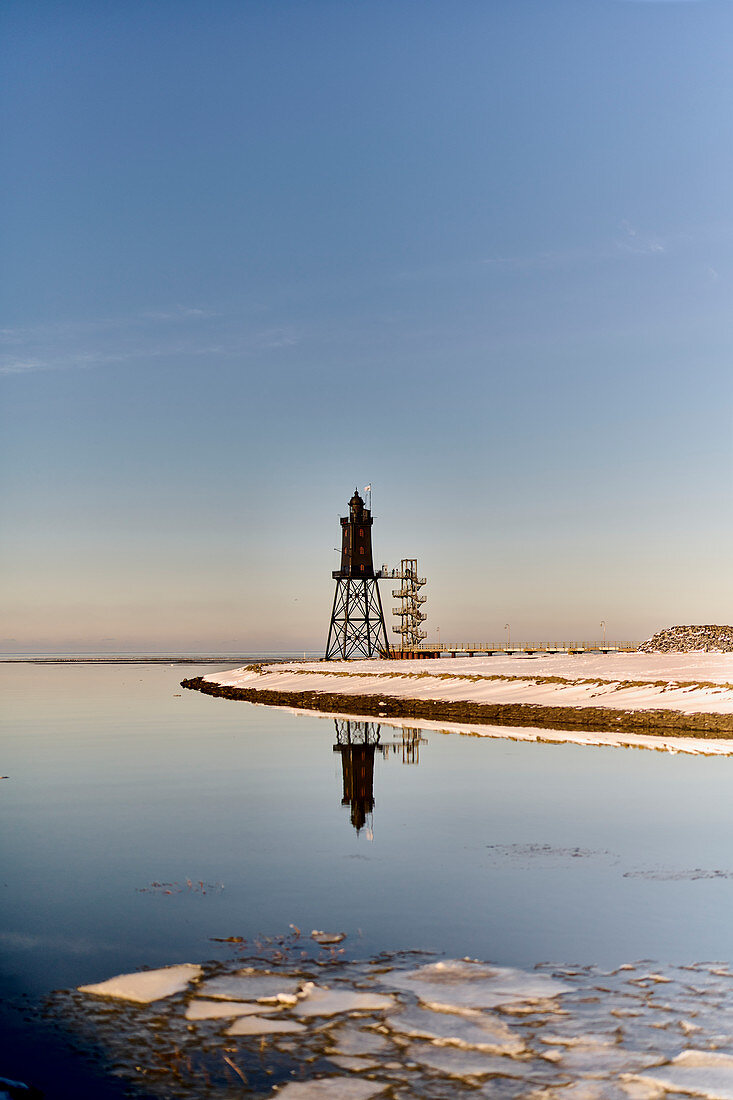 Obereversand lighthouse with mirror image, Dorum, Lower Saxony, Germany