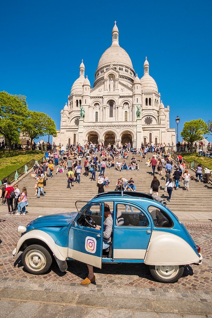 France, Paris, Montmartre, the Sacred Heart and a 2CV