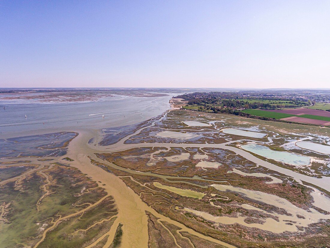 France, Somme, Baie de Somme, Saint Valery sur Somme, Cape Hornu, the salted meadows invaded by the sea during high tides, the channels and the ponds of hunting huts are then clearly visible (aerial view)