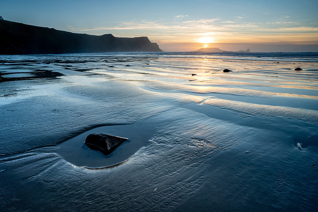 Rhossili Bay beach at low tide, at sunset, Rhossili, Gower Peninsula, Swansea, Wales, United Kingdom, Europe