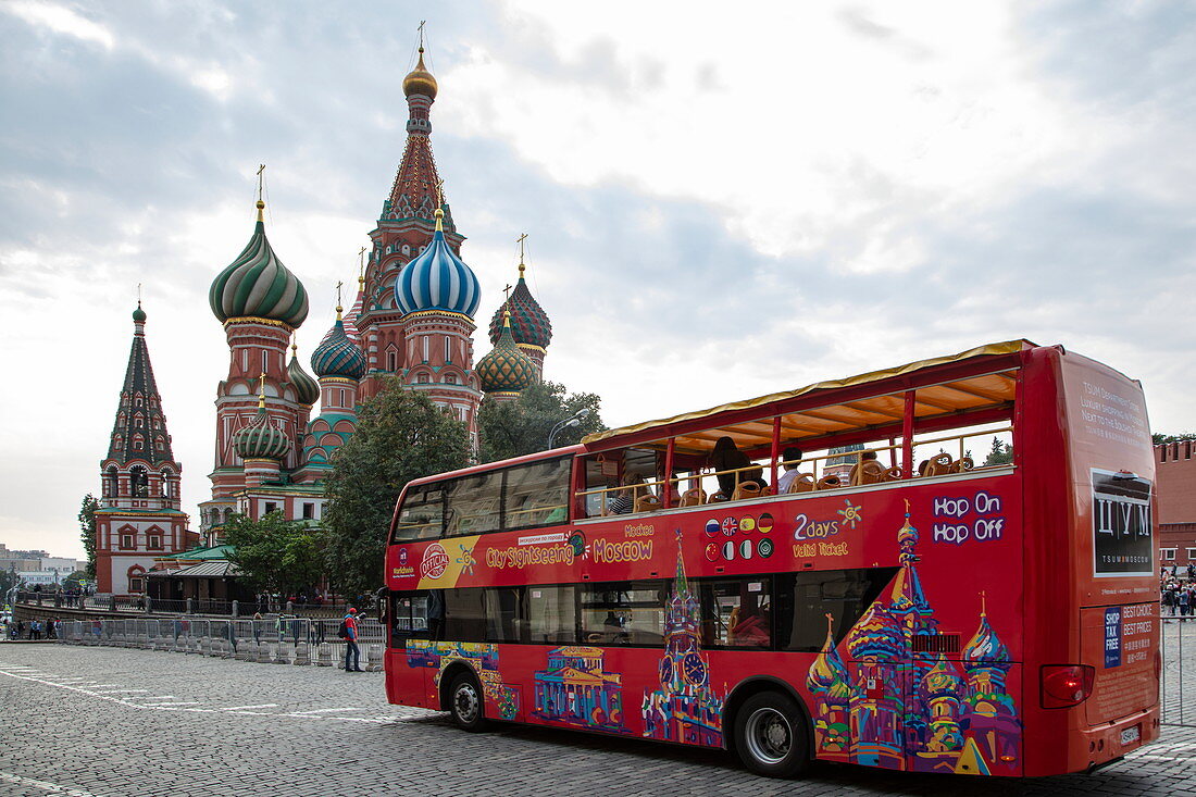 Hop On Hop Off Moscow City Sightseeing Bus in front of St. Basil's Cathedral on Red Square, Moscow, Russia, Europe