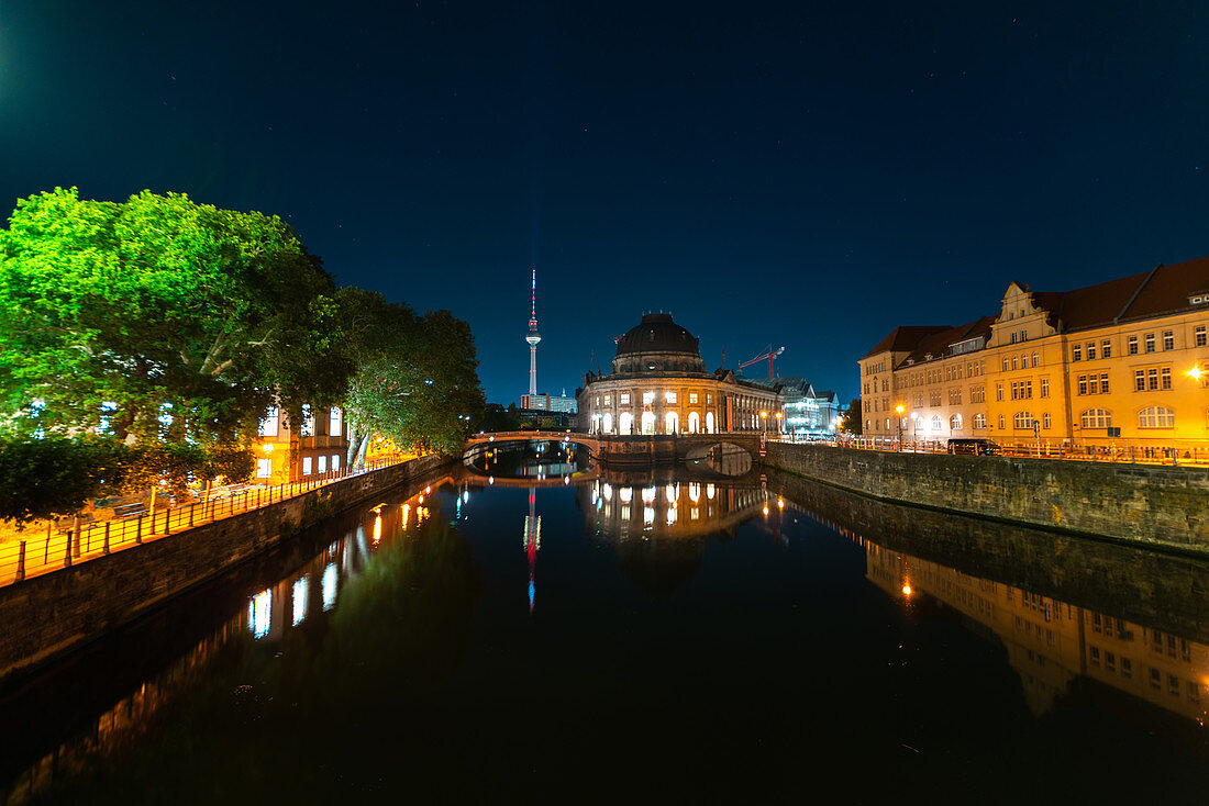 View of Bode Museum and Fernsehturm Berlin reflecting in River Spree