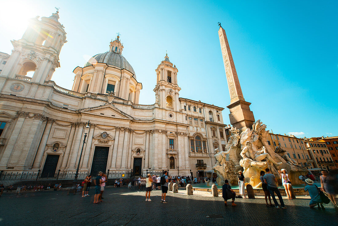 Low angle view of people at Sant'Agnese in Agone and Fiumi Fountain,Rome