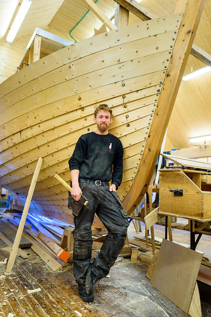 Boat builder in the museum and boatyard for Nordland boats, Viking Museet Stadsbygd, Trondelag district, Norway