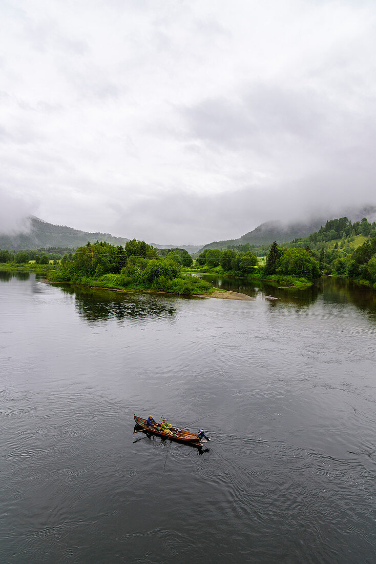 Salmon anglers with wooden boats on the Namdalen River, Grong, Norway