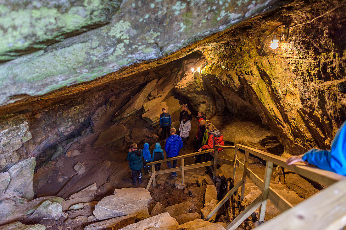 Guided tour of the Grønligrotte cave, south of the Svartisen glacier, Norway