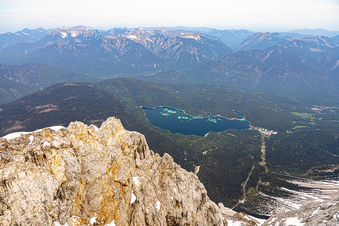View from Zugspitze summit to the turquoise blue Eibsee, Grainau, Upper Bavaria, Germany