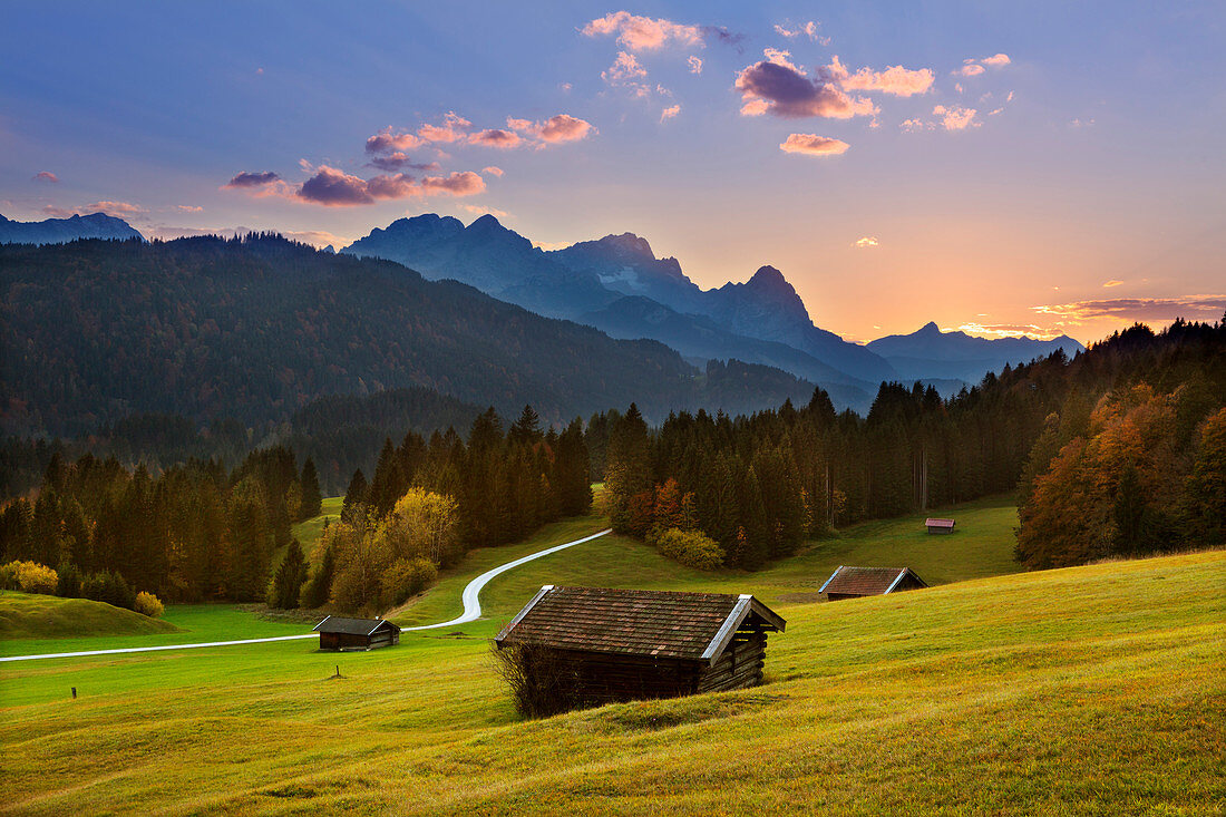 Dusk, view of the Zugspitze massif with Alpspitze, Zugspitze and Waxenstein, Werdenfelser Land, Bavaria, Germany